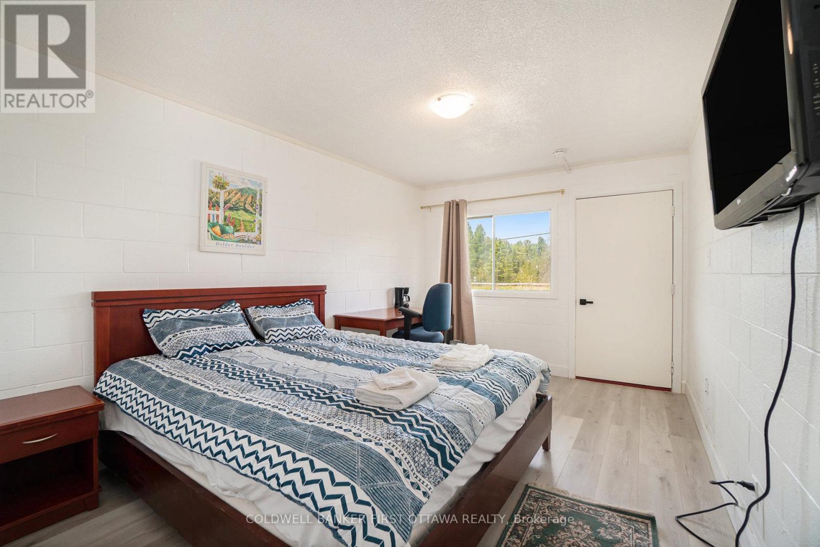 9628 Hwy 509, North Frontenac, Ontario  K0H 2J0 - Photo 9 - X12219606